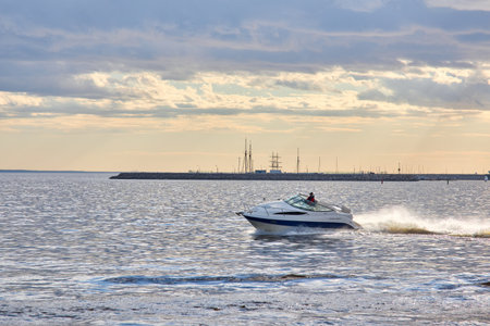 Photo of a boat sailing in the bayの写真素材