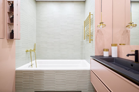 An Exquisite and Stylish Modern Bathroom Decorated with Elegant Fixtures and Soft Colors