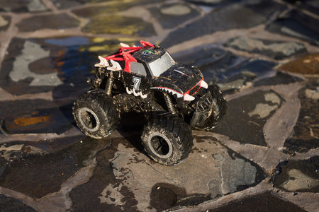 The Exciting RemoteControlled Monster Truck Designed for Action on a Stony Surface