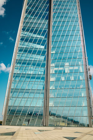 The Modern Glass Skyscraper features a bold, unique architectural design that captivates
