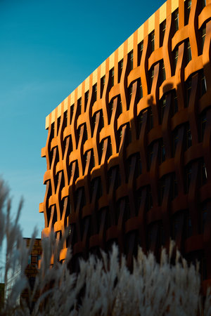 Explore Modern Architectural Design Featuring a Unique Facade and Intriguing Shadow Play