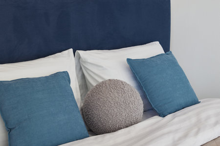 Discover Stylish Bedroom Decor with Cozy Textiles and inviting Pillows for aesthetic appeal