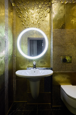 Luxurious GoldThemed Modern Bathroom Design A Sophisticated and Elegant Space for Comfortの写真素材