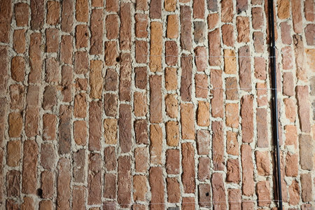 A detailed brick wall background perfect for design and architecture applications