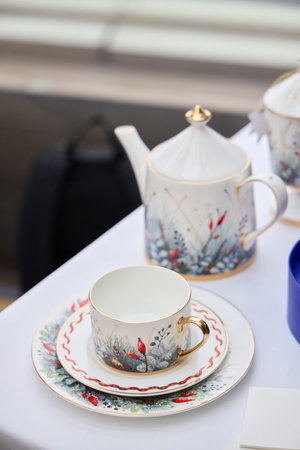An Elegant Tea Set featuring a Floral Design including a beautifully crafted Teapotの写真素材