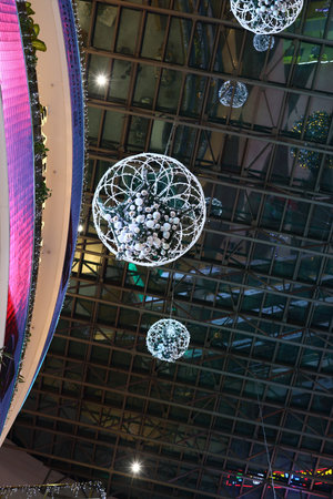 Beautiful and Elegant Decorative Lights Hanging Gracefully from a Modern Ceiling Designの写真素材