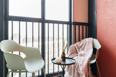 A Cozy Balcony Featuring Modern Decor Combined with a Beautiful Scenic View to Enjoyの写真素材