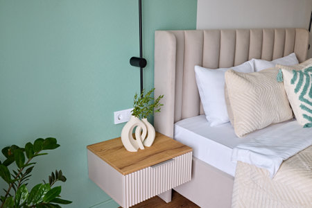 Explore Modern Bedroom Decor Featuring Lush Green Walls Enhanced by Cozy and Inviting Accents