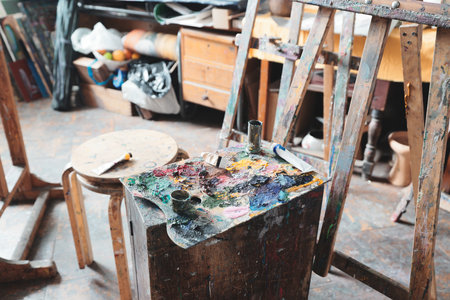 Artistic Studio featuring a Paint Palette and Easel for artistic creations and expressionsの写真素材