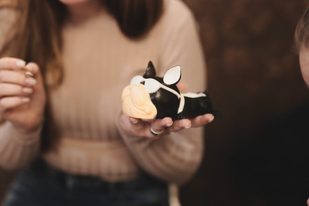Engaging in Creative Dessert Decoration with Delightful and Fun AnimalShaped Cookiesの写真素材