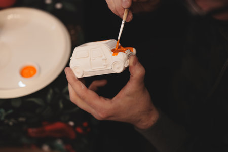 Join us for an exciting Artistic Model Car Painting Session filled with vibrant colorsの写真素材