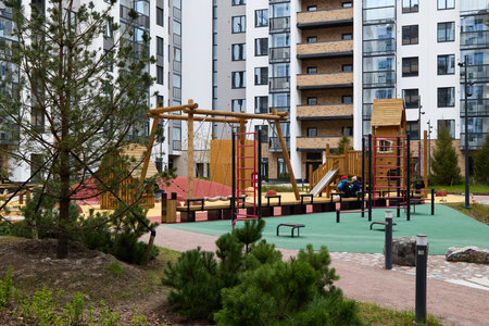 A Modern Playground Designed for Enjoyment in an Urban Residential Area for Childrenの写真素材