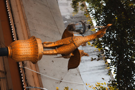 An Elegant Decorative Lantern Featuring an Ornate Bird Design for Enhanced Ambiance Effects