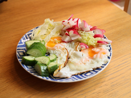 Enjoy a Healthy and Nutritious Breakfast made with Eggs and Fresh Vegetables for Energyの写真素材