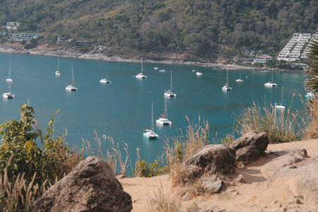 Serene Seascape featuring Moored Yachts gracefully bobbing in Tranquil Waters of the oceanの写真素材