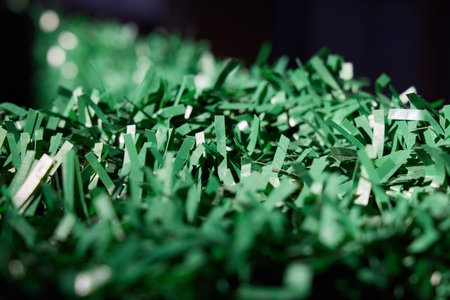 Vibrant and EyeCatching Green Shredded Paper Ideal for Various Crafts and Decorations Projectsの写真素材