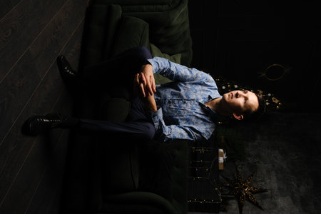 A Stylish Male Portrait Set in a Sophisticated and Elegant Environment for Artistic Expressionの写真素材