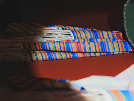 A Beautiful Array of Colorful Woven Textiles Stacked Stylishly in an EyeCatching Mannerの写真素材