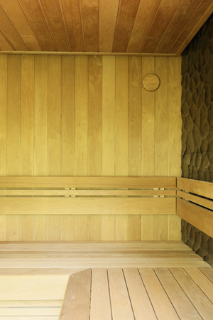 Modern wooden saunas feature natural finishes that enhance relaxation and comfortの写真素材