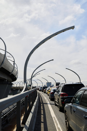 A Traffic Jam on a Futuristic Bridge, showcasing modern urban infrastructure and transport