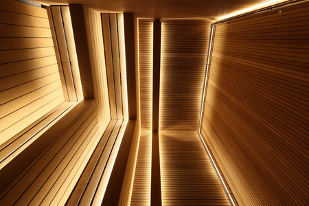 Enjoy elegant wooden ceilings with soft LED lighting that creates a cozy atmosphereの写真素材