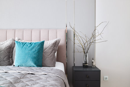 A Stylish and Contemporary Bedroom Interior Featuring Warm, Cozy Elements and Modern Design