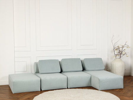 Discover a Modern Minimalist Sofa in Soft Blue Fabric, ideal for stylish, standout interiors