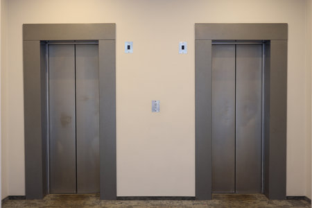 Modern Elevator Doors in a Contemporary Building Design Provide Accessibility and Convenience