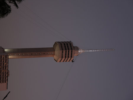 The Iconic Tower at Dusk A Beautifully Illuminated Landmark in the Cityscape at Night