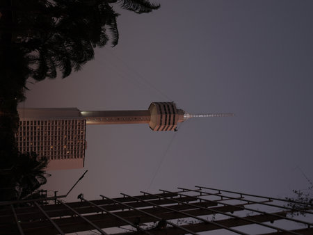 The Iconic Tower at Dusk Features an Urban Backdrop That Captivates All Who See It