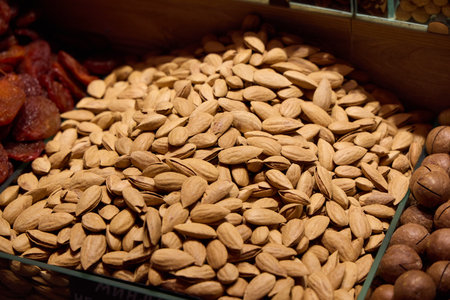 A Beautiful Display of Fresh Almonds at the Local Market is Truly Appealing and Invitingの写真素材