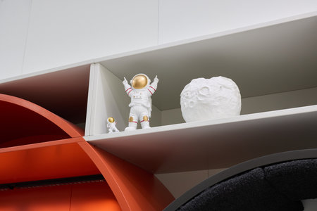 A Creative Display featuring an Astronaut Figure along with Various Decorative Elementsの写真素材