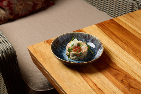 Gourmet Dish Presentation in a Cozy Setting That Invites You to Savor Every Biteの写真素材