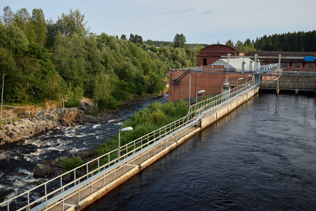 Hydropower Facility Immersed in Beautiful Nature, Showcasing Sustainable Energy Solutionsの写真素材