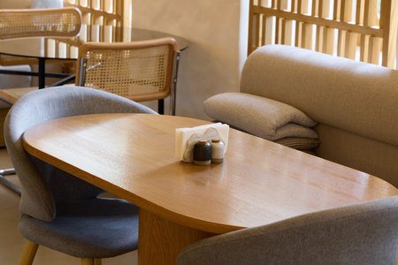 Cozy Modern Caf Interior with Stylish Furniture and Relaxing Atmosphereの写真素材