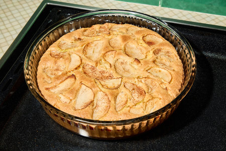 Delicious and Irresistible Apple Dessert in a Beautiful Glass Dish Freshly Baked to Perfection
