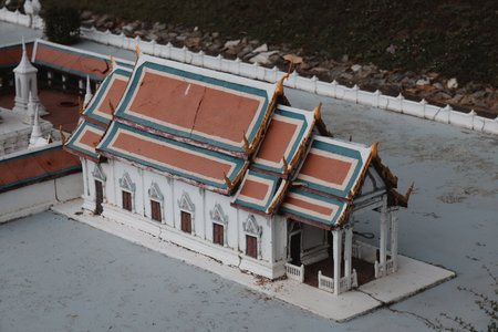This is a captivating miniature model of an intricately designed Asian temple structureの写真素材