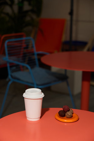 Cozy Caf Scene with Coffee and Chocolatesの写真素材