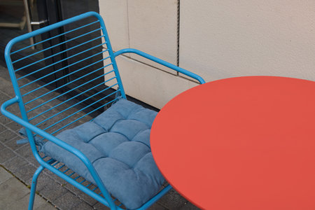 A Colorful and Modern Outdoor Furniture Setting That Invites Relaxation and Styleの写真素材