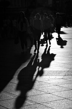 Walking people in the city, silhouettes, black and white street photographyの写真素材