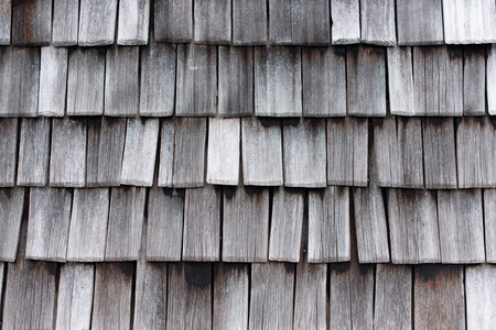 a detail of a weathered wooden roof, architecture detail, wooden texture, abstract backgroundの写真素材