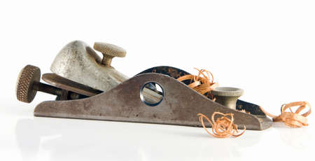 Old Vintage Wood PLane with Shavings of Last Workの写真素材