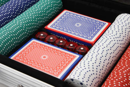 Playing cards dice poker chips all used for gamblingのeditorial素材