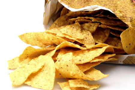Fresh bag of yellow corn chips waiting for cheese
