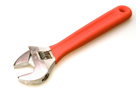 Red handle adjustable wrench for use on boltsの写真素材