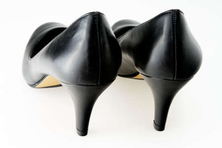 Woman's black high heeled formal dress shoesの写真素材