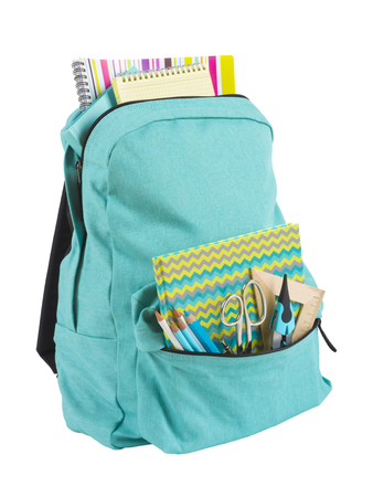 Backpack full of school supplies isolated on white backgroundの写真素材