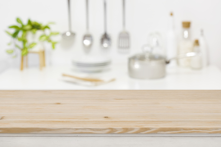 Wood table top for product display on blurred kitchen backgroundの写真素材