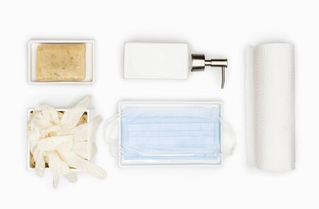Hand hygiene products, protection masks and gloves isolate on whiteの写真素材