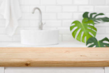 Classic wood texture table for product display before blurred bathroomの写真素材